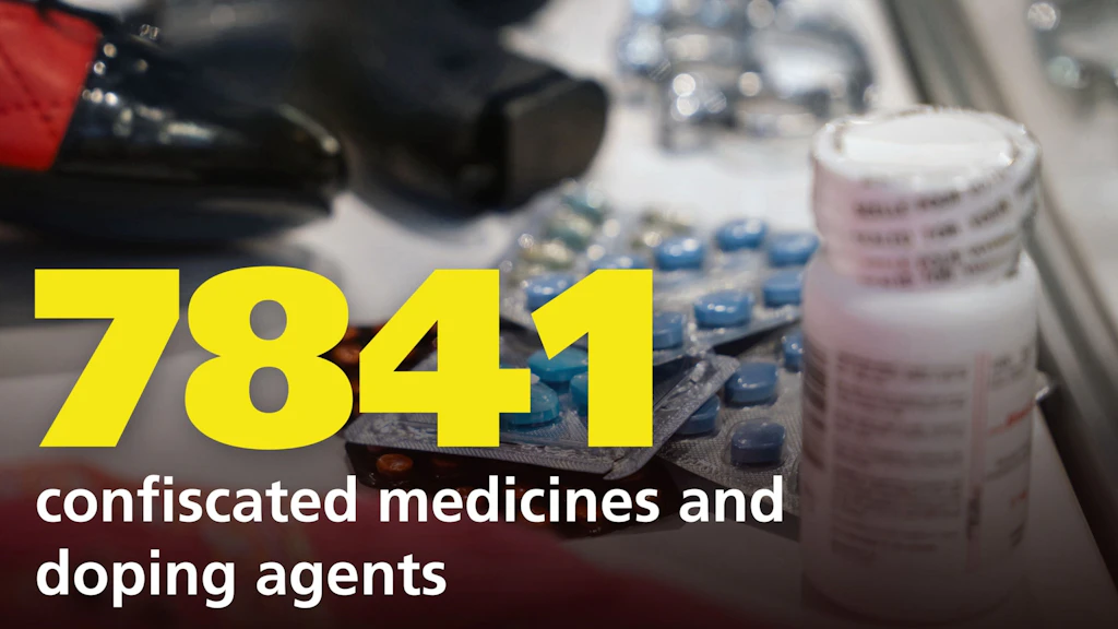The number 7841 is shown prominently in yellow in the foreground. Behind it are various medicines in blister packs and a white medicine bottle. The text states that 7841 shipments containing medicines and doping substances were uncovered.