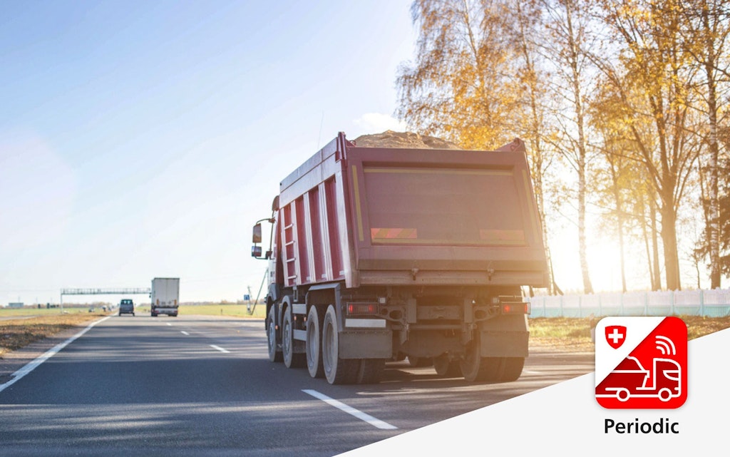 A truck is driving on a rural road in an autumn landscape. The Periodic logo is visible in the bottom right corner.