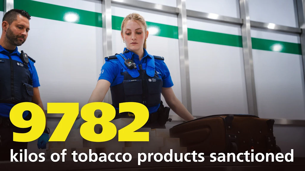 Two FOCBS staff members inspect a suitcase at a border checkpoint. In the foreground, the number 9782 represents the amount of sanctioned tobacco-containing products in kilograms. The scene highlights action against illegal tobacco products.