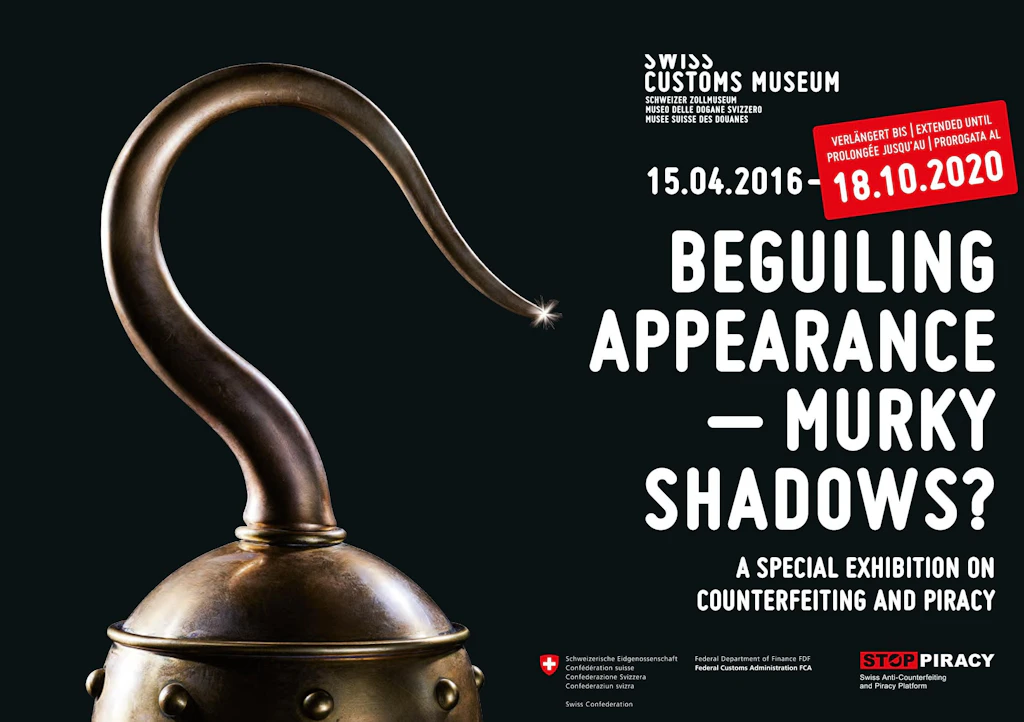 Poster of the exhibition "Beguiling appearance - Murky Shadows?" at the Swiss Customs Museum, extended until 18.10.2020. The exhibition addresses counterfeiting and piracy.