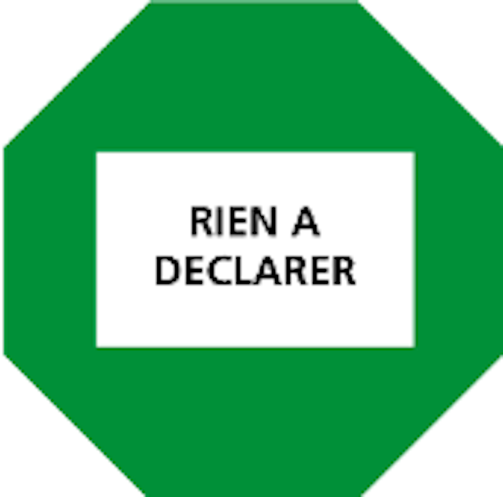 Un panneau octogonal vert avec l'inscription "RIEN À DÉCLARER" au centre. Il indique qu'il n'y a pas de marchandises à déclarer.  