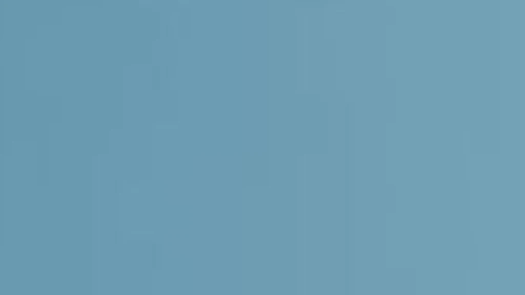 Una mano tiene una lente d'ingrandimento nera e il segno di paragrafo diventa visibile in essa.